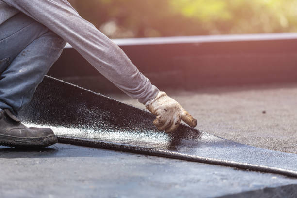 Professional Waterproofing technician working in Enon, OH